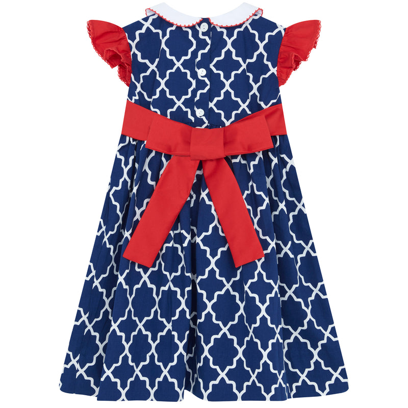 Little Princess Aurora Hand Smocked Embroidered Flags Cotton Baby Dress Navy Red White | Holly Hastie London